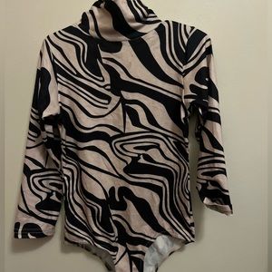 Toddler girl beige and black bodysuit